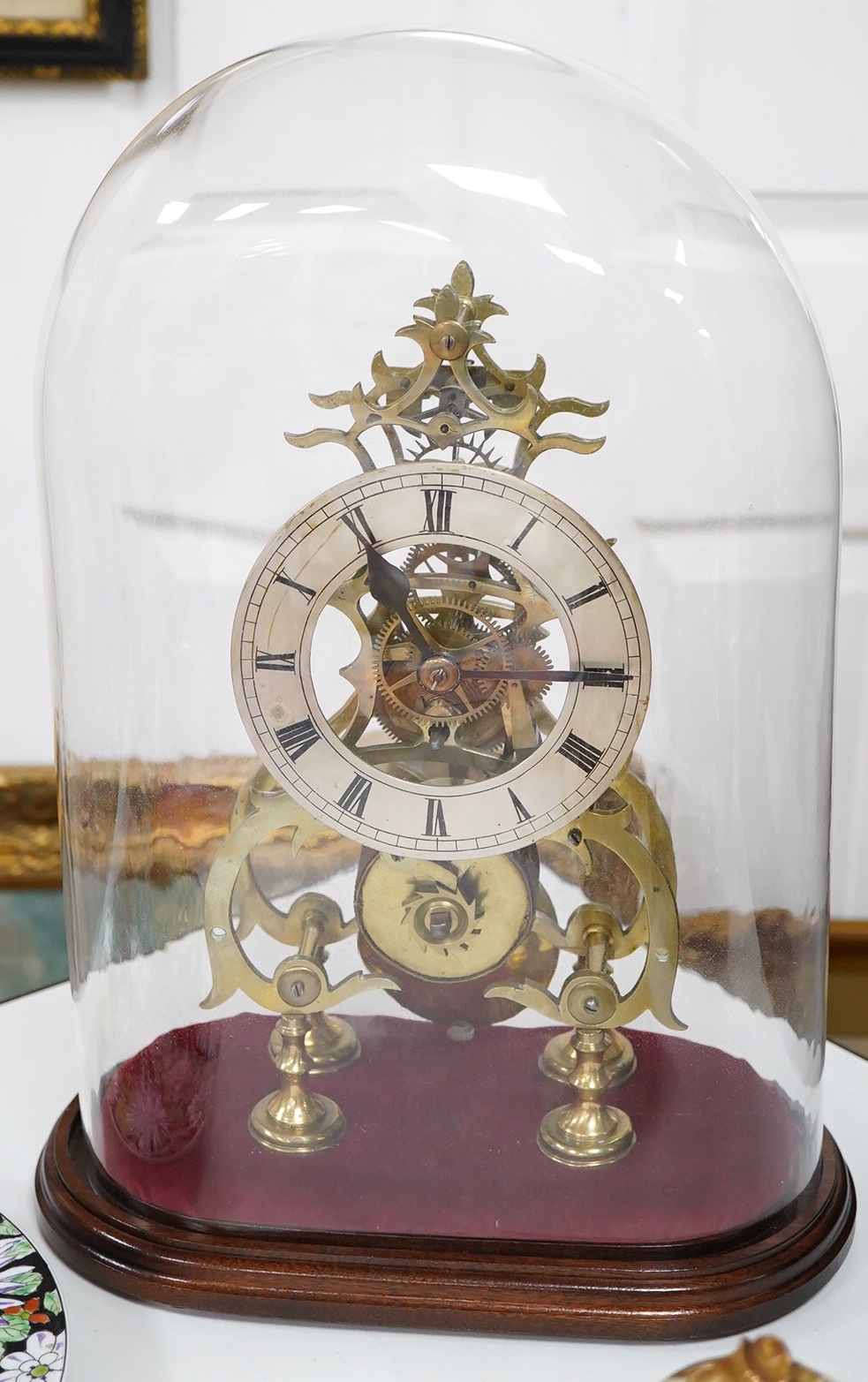 A 19th century skeleton timepiece under a dome, 41cm